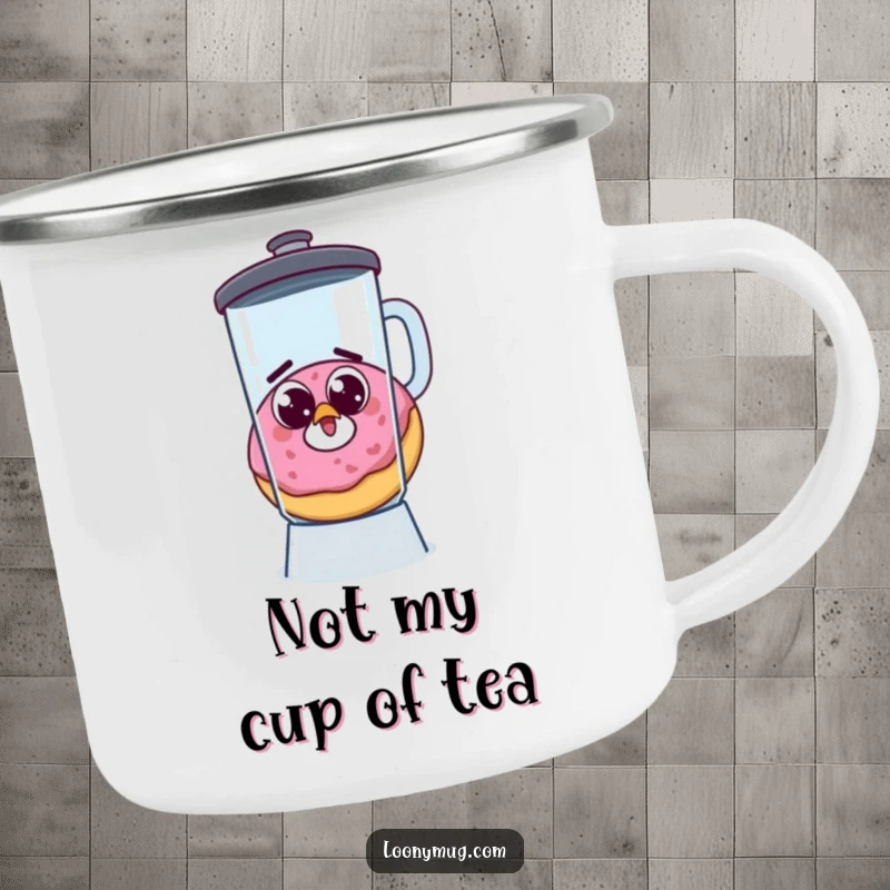 Funny camping mug featuring a startled donut, googly eyes, escaping a blender, for humorous outdoor enjoyment.