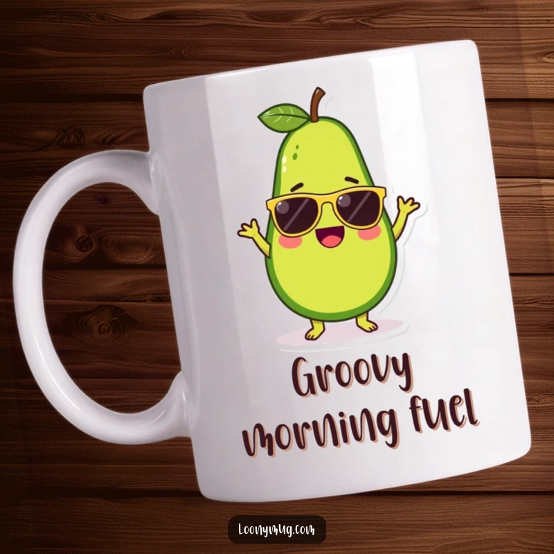 Funny mug featuring a cute avocado character wearing sunglasses and doing a silly, energetic dance, full of life.