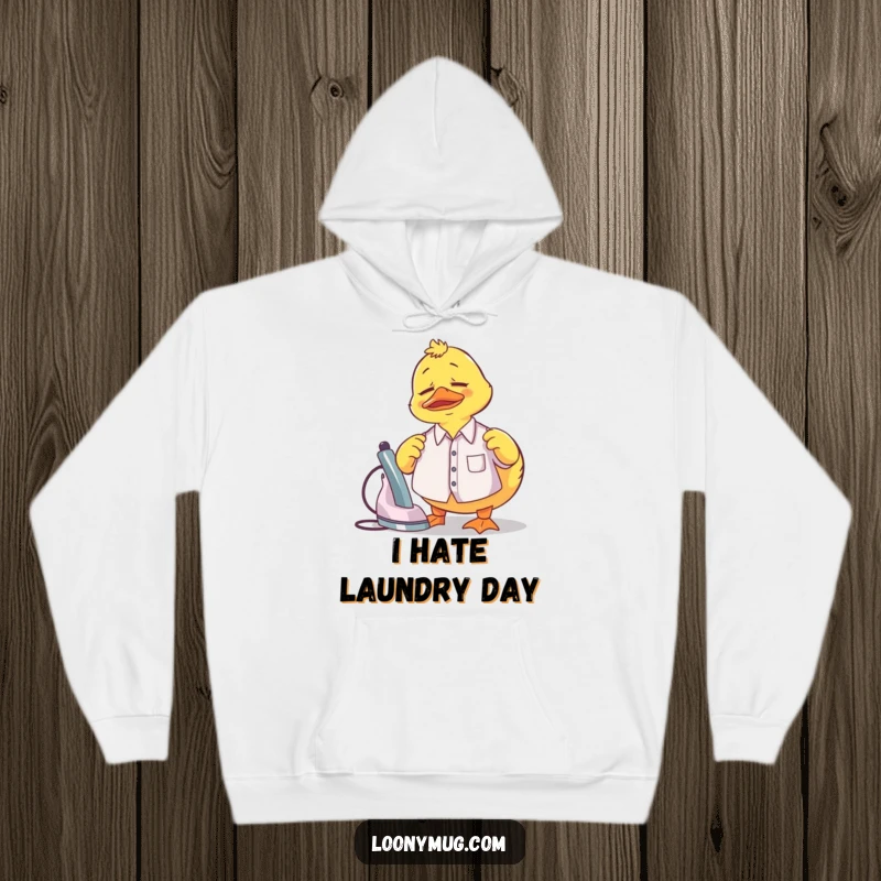 Funny Hoodie showing a confused rubber duck trying to iron a very small shirt, a humorous take on chores.