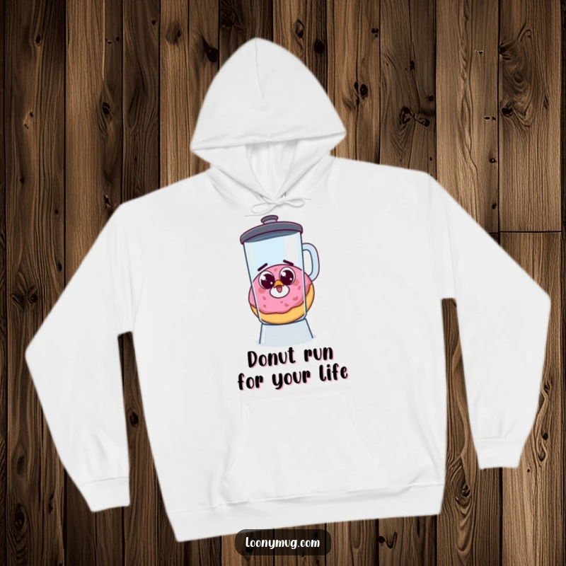 Funny hoodie showing a startled donut with googly eyes, trying to flee a blender, an excellent humorous gift choice.
