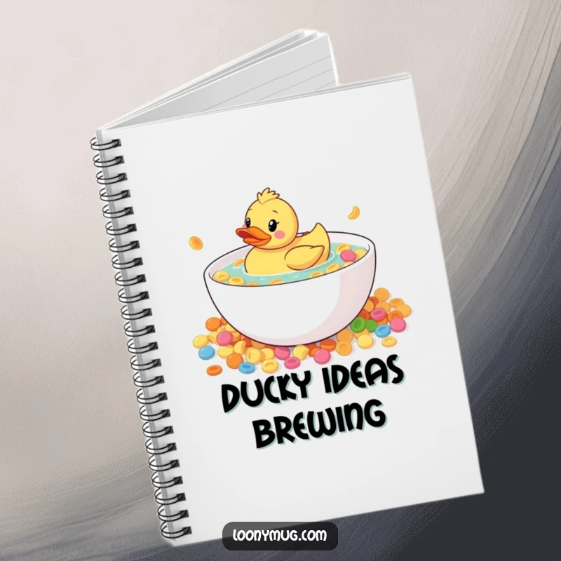 Funny rubber duck in a large cereal bowl, on a notebook cover, perfect for journaling and note-taking, humorous.