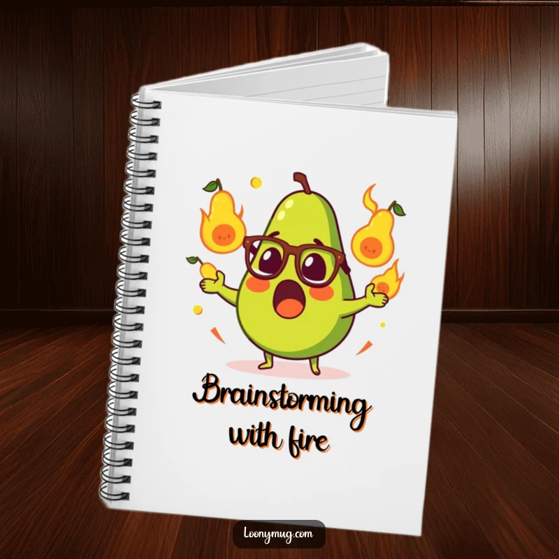 Funny notebook with a surprised avocado, glasses on, juggling flaming pears, perfect for humorous notes and writing.