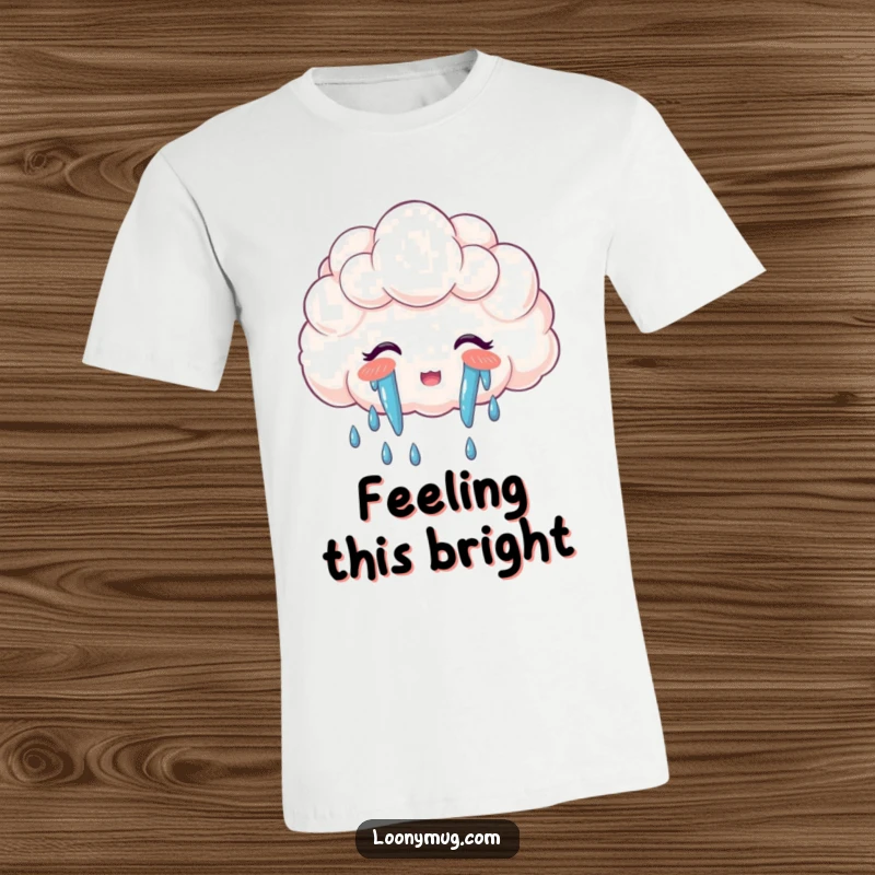 Funny t-shirt: a fluffy cloud joyfully cries colorful rainbow tears, celebrating happiness and whimsical moments.