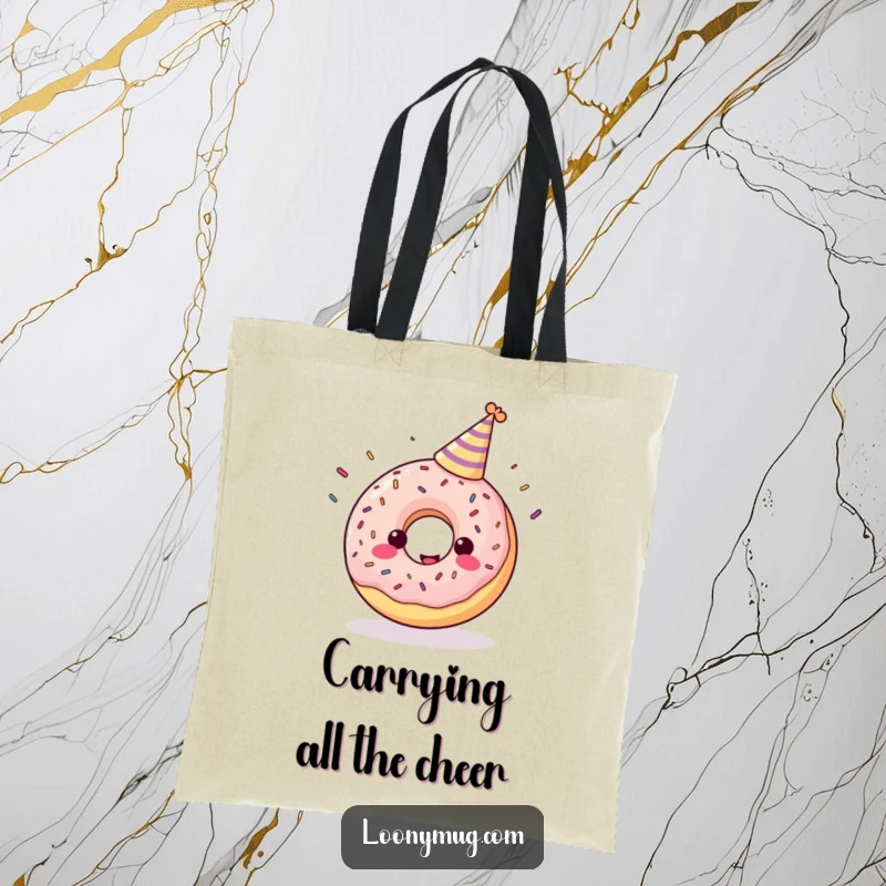 Funny tote bag featuring a cheerful donut in a party hat juggling colorful sprinkles.