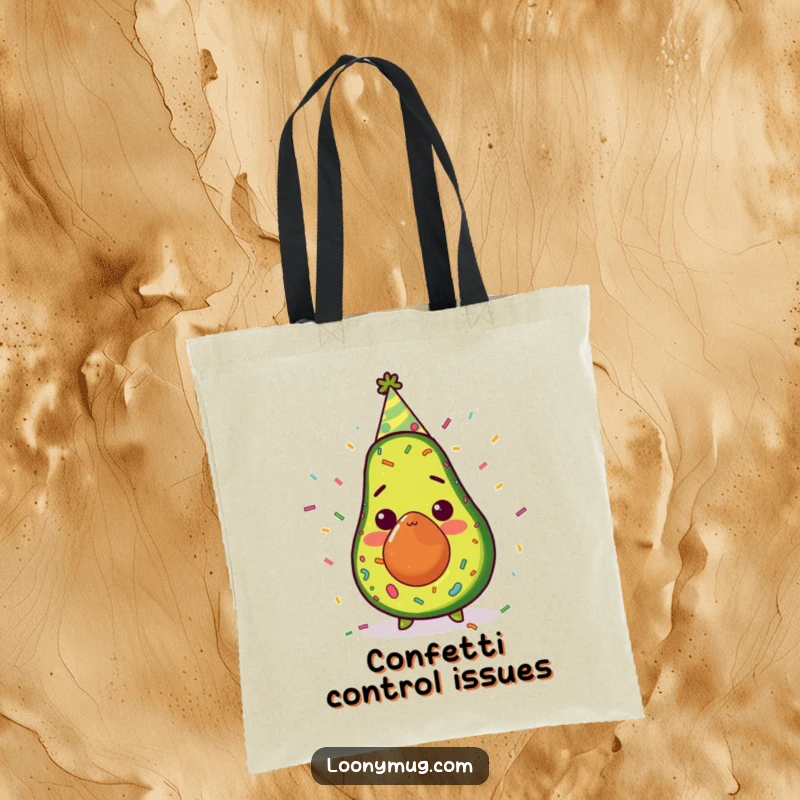 Funny avocado with party hat and confetti, surprised expression, printed on a durable tote bag, great for shopping.